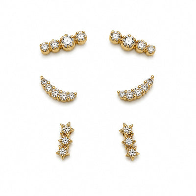 Set de tres pares de aretes dorados en pavé de circonias de distintas formas