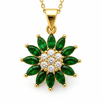 Dije de flor con petalos de piedra verde y centro en pave