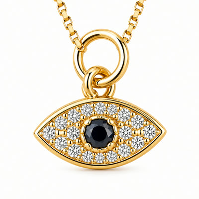 Dije de ojo turco en pave con piedra azul en el centro