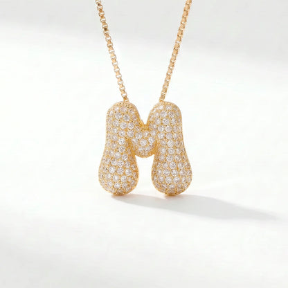 Collar de inicial bubble en oro con la letra M en pavé de circonias