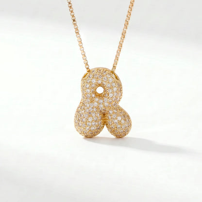 Collar de inicial bubble en oro con la letra R en pavé de circonias