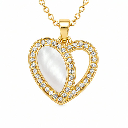 Dije de corazon con centro de nacar y contorno en pave