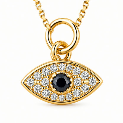 Dije de ojo turco en pave con piedra azul en el centro